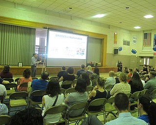 Neighbors | Zack Shively.Poland Union Elementary principal Michael Masucci gave a presentation covering the school's new Bridges math program to parents of kindergarten students in the school's auditorium on Sept. 21. He later gave the same presentation to the parents of the first and second grade students.