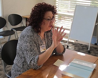 Neighbors | Zack Shively.Librarian Starr Jones shared her thoughts on Kathy McKeon's "Jackie’s Girl: My Life with the Kennedy Family" at a meeting of the "...And the Rest is History" book club at Austintown library on Oct. 2.