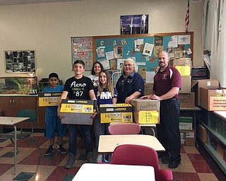 Neighbors | Submitted .Pictured with boxes of donations are (front) Miguel Robles, Jared Mahood, Yasmeen Hammad; (back) Christina DiFabio, Kathy Price (founder, Mission of Love) and Eric Diefenderfer (Glenwood teacher).