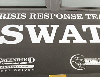   ROBERT K YOSAY  | THE VINDICATOR..The Mahoning Valley Crisis Response Team/SWAT consisting of police officers from the three counties along with YFD and STATMedEvac  had a mock scenario at the Covelli center. The SWAT exercise was to test new radios and equipment as well as prepare for an actual event.-30-