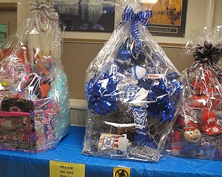 Neighbors | Zack Shively.Poland Union Elementary will hold their 14th annual Holiday Shoppe at the high school on Sat. Nov. 4 from 9 a.m. to 4 p.m. Over 90 craft vendors will set up in the high school gymnasium for the event. They will also hold raffles for over twenty gift baskets, including these three which have toys directed toward girls, Poland Bulldog gear and Ohio State apparel.