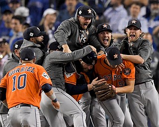 The Houston Astros celebrate after their win against the Los Angeles Dodgers in Game 7 of baseball's World Series Wednesday, Nov. 1, 2017, in Los Angeles. The Astros won 5-1 to win the series 4-3. (AP Photo/Mark J. Terrill)