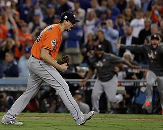 Houston Astros' Charlie Morton reacts after Game 7 of baseball's World Series against the Los Angeles Dodgers Wednesday, Nov. 1, 2017, in Los Angeles. The Astros won 5-1 to win the series 4-3. (AP Photo/Matt Slocum)