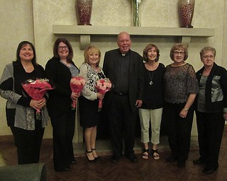 The fall dinner meeting of the Catholic Collegiate Association took place recently at Tippecanoe Country Club. Guest speakers were Monsignor David Rhodes and Sister Dolly from the Antonine Adult Day Care Village. Five new members were welcomed with flower arrangements: Patricia Fagan, Linda Gianolio, Mercia Stevens, Elaine Fabrizi and Rosemary Boccieri. Founded in 1927, the mission of the association is to support local charities and to further education with scholarship. For information on membership, call 330-707-1262. Above, from left, are new members Gianolio, Stevens and Fabrizi, and Monsignor Rhodes, Jeannie Lowry, membership chairwoman; Barbara Banks, vice president; and Anita Stothard, president.