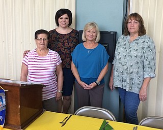 Theresa Adler and Mary Jonda were speakers at the September meeting of the Struthers Rotary Club to discuss the food pantry operated by Struthers Parkside Church. Donations are mainly from parishioners of the church and the Struthers Community Chest and are used to fill grocery bags with nonperishable foods and supplies on a regular basis for the needy residents in the Struthers community. For information, call Maria White at Struthers Parkside Church at 330-755-8233 or by email at info@struthersparksidechurch.com. Above, from left, are Adler; Jennifer Johnson, Rotary president; Linda Krestel, host Rotarian; and Jonda. A book will be donated to the Struthers Elementary School library in the name of the speakers in appreciation for their presentation.