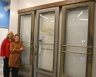     ROBERT K. YOSAY  | THE VINDICATOR..The original Vindicator building on the corner of Vindicator Square and Boardman St  has been renovated and opens for YBI..the three original doors from the Vindicator Building..-30-