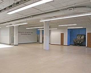     ROBERT K. YOSAY  | THE VINDICATOR..The original Vindicator building on the corner of Vindicator Square and Boardman St  has been renovated and opens for YBI...The first  floor formerly business and circulation now called innovation place..-30-