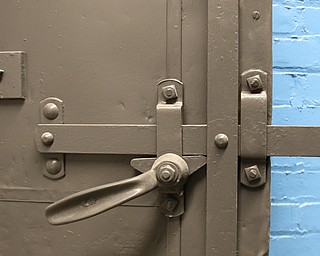     ROBERT K. YOSAY  | THE VINDICATOR..The original Vindicator building on the corner of Vindicator Square and Boardman St  has been renovated and opens for YBI..Keeping  as much of the original... including the door t the power.area..-30-