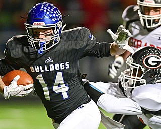 CORTLAND, OHIO - NOVEMBER 3, 2017: Lakeview's Connor Greenwood, right, is knocked into the end zone to score a touchdown by Girard's Terrance Davis during the first half of the OHSAA playoff game, Friday night at Lakeview High School. DAVID DERMER | THE VINDICATOR