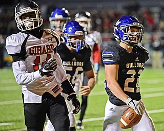 CORTLAND, OHIO - NOVEMBER 3, 2017: Lakeview's Evan Adair, right, celebrates after scoring a touchdown during the first half of the OHSAA playoff game, Friday night at Lakeview High School. DAVID DERMER | THE VINDICATOR..Girard's Terrance Davis pictured.