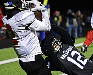 CORTLAND, OHIO - NOVEMBER 3, 2017: Girard's Michael Belcik, left, catches a touchdown over Lakeview's Michael Hill during the first half of the OHSAA playoff game, Friday night at Lakeview High School. DAVID DERMER | THE VINDICATOR