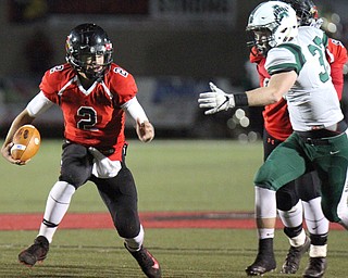 William D Lewis The Vindicator Canfield's Vinny Fiorenza (2) bangs up the middle for yardage eluding Auroara's Brock Mancini(33)during 11-3-17 playoff action with Aurora at Canfield.