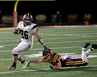 Crestview's Andrew Yanssens(26) pushes down South Range's Brennan Toy(26) during the first quarter as Crestview High School takes on South Range High School, Friday, Nov. 3, 2017, at Raider's stadium at the Rominger Sports Complex in Canfield...(Nikos Frazier | The Vindicator)..