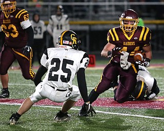 South Range's Peyton Remish(44) weaves to avoid Crestview's Danny Moore(25) during the first quarter as Crestview High School takes on South Range High School, Friday, Nov. 3, 2017, at Raider's stadium at the Rominger Sports Complex in Canfield...(Nikos Frazier | The Vindicator)..