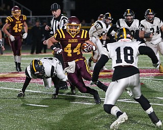 South Range's Peyton Remish(44) weaves to avoid Crestview's Austin Brodigan(18) during the first quarter as Crestview High School takes on South Range High School, Friday, Nov. 3, 2017, at Raider's stadium at the Rominger Sports Complex in Canfield...(Nikos Frazier | The Vindicator)..