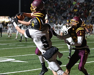 South Range's Josh Stear(20) intercepts the ball intended for Crestview's Dylan Huff(9) just yards from the endzone during the second quarter as Crestview High School takes on South Range High School, Friday, Nov. 3, 2017, at Raider's stadium at the Rominger Sports Complex in Canfield. South Range's Isaac Allegretto(12) watches on...(Nikos Frazier | The Vindicator)..
