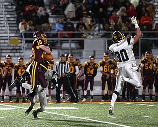 South Range's Mathias Combs(18) catches the ball as Crestview's Dakota Stratton(30) attempted to intercept during the second quarter as Crestview High School takes on South Range High School, Friday, Nov. 3, 2017, at Raider's stadium at the Rominger Sports Complex in Canfield...(Nikos Frazier | The Vindicator)..