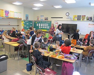 Neighbors | Zack Shively.After the parade, the Stadium Drive Elementary students enjoyed parties in their classrooms. Pictured is Lisa Hughes's fourth-grade class.