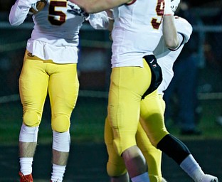 POLAND, OHIO - NOVEMBER 3, 2017: Mooney's Nico Marchionda (5) celebrates his TD catch with his teammates during the 2nd qtr. at Bulldog Stadium. MICHAEL G TAYLOR | THE VINDICATOR