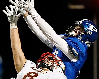 POLAND, OHIO - NOVEMBER 3, 2017: Poland's Nate Alessi (15) tries to make a desparate, last play 4th down pass but it is knocked away by Mooney's Brennan Olesh (8) during the 4th qtr. at Bulldog Stadium. MICHAEL G TAYLOR | THE VINDICATOR
