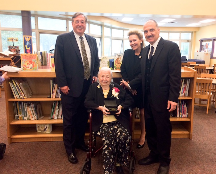Jeanne Tyler, benefactress of the Tyler Mahoning Valley History Center, was honored with the 2017 Pioneer Award for her lifetime of service to the cultural needs of the community recently at the Founder’s Day program, hosted by the William Holmes McGuffey Elementary School. Pictured, from left, are David Tod, godson of Tyler’s late husband, John Tyler; Tyler; Tod’s wife, Rollin Tod; and Richard Scarsella, chairman of the William Holmes McGuffey Historical Society.