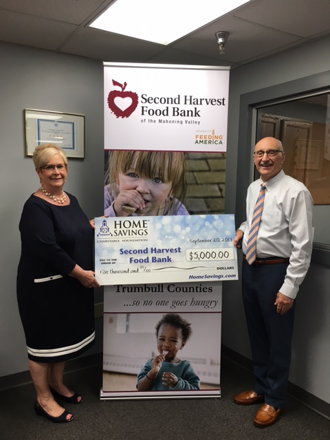 Home Savings Charitable Foundation recently donated $5,000 to Second Harvest Food Bank of the Mahoning Valley. The funds will be used for the Warehouse Expansion Project. According to Michael Iberis, executive director of Second Harvest, a record 10.5 million pounds of food was distributed in 2016, and the food bank is on track to match that this year. For more information about Second Harvest Food Bank, call 330-792-5522 or visit mahoningvalleysecondharvest.org. Above left, Diana Hogg, vice president, commercial relationship manager with Home Savings presents the donation to Iberis.