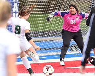 Lake Catholic forward Keka Babic (9) scores a goal against Canfield goalie Lauren Slanker (4) during the first half as Lake Catholic High School takes on Canfield High School in the Division II Regional Final, Saturday, Nov. 4, 2017, at Gilcrest Field at Portage Community Bank Stadium in Ravenna, Ohio. Lake won 2-0...(Nikos Frazier | The Vindicator)..