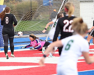 Lake Catholic forward Keka Babic (9) scores a goal against Canfield goalie Lauren Slanker (4) during the first half as Lake Catholic High School takes on Canfield High School in the Division II Regional Final, Saturday, Nov. 4, 2017, at Gilcrest Field at Portage Community Bank Stadium in Ravenna, Ohio. Lake won 2-0...(Nikos Frazier | The Vindicator)..