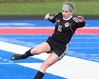 Canfield defender Ellie Accordino (16) kicks the ball away from the Canfield territory during the first half as Lake Catholic High School takes on Canfield High School in the Division II Regional Final, Saturday, Nov. 4, 2017, at Gilcrest Field at Portage Community Bank Stadium in Ravenna, Ohio. Lake won 2-0...(Nikos Frazier | The Vindicator)..