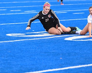 Canfield midfielder Chloe Kalina (22) and Lake Catholic forward Andrea Babic (23) fall down after fighting for the ball during the first half as Lake Catholic High School takes on Canfield High School in the Division II Regional Final, Saturday, Nov. 4, 2017, at Gilcrest Field at Portage Community Bank Stadium in Ravenna, Ohio. Lake won 2-0...(Nikos Frazier | The Vindicator)..