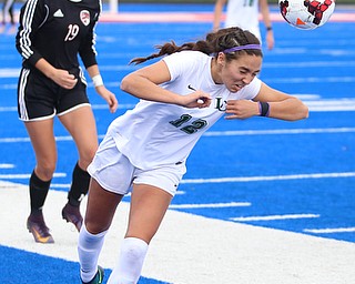 Lake Catholic midfielder Kati Druzina (12) heads the ball during the second half as Lake Catholic High School takes on Canfield High School in the Division II Regional Final, Saturday, Nov. 4, 2017, at Gilcrest Field at Portage Community Bank Stadium in Ravenna, Ohio. Lake won 2-0...(Nikos Frazier | The Vindicator)..