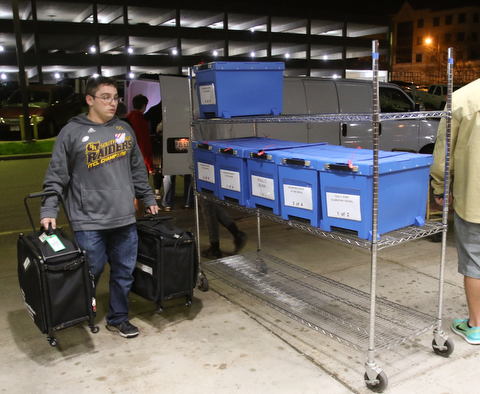   ROBERT K YOSAY  | THE VINDICATOR..The Ballots came in as Travis Bernard from South Range carry election materials from the trucks to the Bd of Elections..-30-