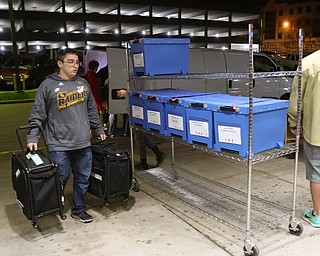 ROBERT K YOSAY | THE VINDICATOR..The Ballots came in as Travis Bernard from South Range carry election materials from the trucks to the Bd of Elections..-30-