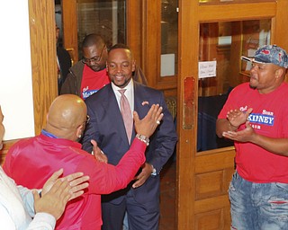 ROBERT K YOSAY | THE VINDICATOR..Sean McKinney enters the B&O station as results came down for Tito Brown Well wishers congratulated him on his race...-30-