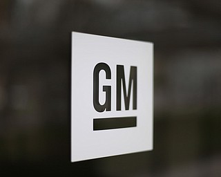 FILE - This Friday, May 16, 2014, file photo, shows the General Motors logo at the company's world headquarters in Detroit. After billions in losses and years of unsuccessful turnaround attempts in Europe, General Motors decided that a foothold in the worldâ€™s third-largest auto market isnâ€™t worth the drag on its bottom line. The Detroit automaker on Monday, March 6, 2017, announced that itâ€™s all but getting out of Europe, selling its Opel and Vauxhall units to French automaker PSA Group. (AP Photo/Paul Sancya, File)