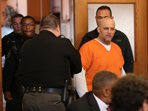 Nasser Hamad is led into Judge Ronald Rice's courtroom by Trumbull County Sheriff's Deputies to hear the jury's verdict, Wednesday, Nov. 8, 2017, at the Trumbull County Court House in Warren...(Nikos Frazier | The Vindicator)