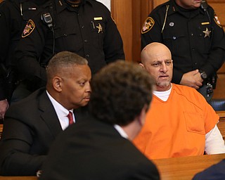 Nasser Hamad talks with his attorneys before learning the verdict in his aggravated murder trial, Wednesday, Nov. 8, 2017, at the Trumbull County Court House in Warren...(Nikos Frazier | The Vindicator)