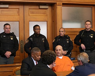 Nasser Hamad talks with his attorneys before learning the verdict in his aggravated murder trial, Wednesday, Nov. 8, 2017, at the Trumbull County Court House in Warren...(Nikos Frazier | The Vindicator)