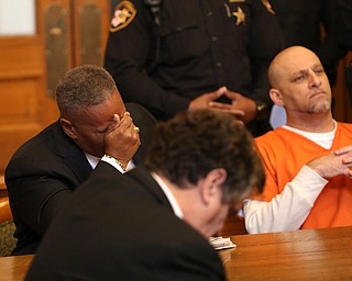 Atty. Geoffrey Oglesby holds his head as Judge Ronald Rice reads the jury's verdict in Nasser Hamad's(right) aggravated murder case, Wednesday, Nov. 8, 2017, at the Trumbull County Court House in Warren. Hamad was sentenced to life in prison with parole eligibility after 30 years. ..(Nikos Frazier | The Vindicator)
