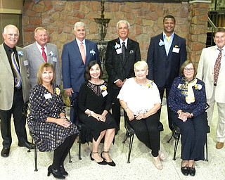 Farrell High School Alumni Hall of Fame inducted its 2017 class at its 13th annual banquet Oct. 14 at the Park Inn by Radisson, 3377 New Castle Road, West Middlesex, Pa., before a crowd of more than 250 alumni and friends. The hall of fame has enshrined 129 honorees since its first dinner in 2005. Jim Raykie is executive director of the FAHF and Ted Pedas serves as adviser. Above, inductees, seated in front row, from left, are Dr. Melanie Komar-Samardija, ’71; Tahme Gracenin Deitz, ’67; Carole Chiccarino, accepting for her late husband, Jerry “Jay” Chiccarino, ’58; and Annette Kryzsiek Thompson, ’61. From left in back row are H. Mark Schreiber, ’68; Dr. Robert J. Kudelko, ’64; Robert A. Pacsi, ’64; Frank A. Scoccia, ’56; Vernon L. Stewart, ’82; and Steve D. Gurrera, ’65.