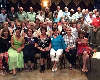 The Cardinal Mooney High School Class of 1962 had its 55th class reunion recently at Johnny’s Restaurant. The alumni came from as far as California, Colorado and Las Vegas. In Row 1, seated from left, are Margie Gaca Hoover, Audrea Marsch Neri, Maureen Reese Krull, Yvonne Joseph Marzano, Ginger Leone Kubala, Louise Restle Naples and Lorraine Naples Liberato. Row 2: Peggy McDermott Gresko, Sue Bailey Hunter, Ruth Yozwiak Lewis, Georgia Colla Leone, Rich Vendetti, Judy Tavalaro Soccorsi, Terry Archer Wilson and Mike Crogan. Row 3: Pat O’Connor Hughes, Patty Fecko Petrella, Patti Donnelly Koenig, Dennis Gruber, Tony Monaco and Paula Higgins Rakocy. Row 4: Partially hidden, Michele Tomaskovic Restivo, Karen Miller Gruber, Jean Phelan Casey, Eileen Hartwig Hall, partially hidden, Cynthia Courtney Landers, Monica Gura Bramer and Billie Schilling Sicafuse. Row 5: Tony Donofrio, Ray Lawrence, Dan Lyden, Rich Hughes, Mile Dohar, Sheryl Petrella, Pauline Scheetz Heid, Tony Lamancusa, John Dornstettar, Bill Burke, Don Gresko, John McLaughlin, Don Lapresta, Mike Boyle, Mick Cooney, Tom Nelis, Vince Lisi and Dan Doran. Missing from picture are: Jim Lopatta, Ray (Rip) Repasky, Pat Traficant, Gloria Yencha Traficant, Buzzy Papalia and Dan Rhattigan.