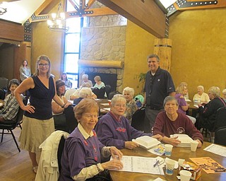 Neighbors | Zack Shively.Seniors met in Boardman Park's Lariccia Family Community Center for Senior Fun Day on Sept. 28 for a craft, a blood pressure screening, bingo, a speaker, lunch and an exercise. Pictured are director Mona Mangiarelli (left) and guest speaker Stephen Kristan of AT&T (right) with the senior citizens at the event.