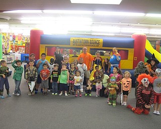 Neighbors | Zack Shively.Austintown Bounce had a Halloween party on Oct. 14. The event included popcorn, a small drink, a treat bag, a parade, special games, prizes and unlimited bouncing with the price of admission. Pictured in the middle is co-owner Bruce Shepas.