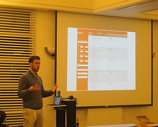 Neighbors | Zack Shively.Luke Papalko went over the "Apples to Apples" page at Austintown library. "Apples to Apples" compares the rates and other information for multiple electric or gas companies.