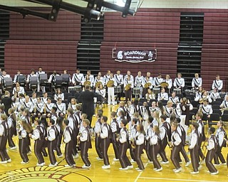 Neighbors | Zack Shively.The Boardman marching band performed a number of songs in concert formation, but they got up and moved during Harry Belafonte's "Jump in the Line." The event celebrated the band's hard work over the course of the marching season and allowed them to have a night to play all the songs they learned in the course of the season.