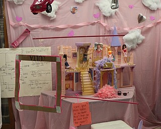 Neighbors | Abby Slanker.A group of Canfield High School senior physics students created a Barbie mobile to display at the school’s annual Mobile Mania on Nov. 2.