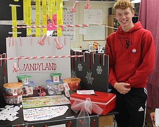 Canfield High School senior physics student Sam Accordino and his group created a mobile titled "Candyland," on which they balanced bundles of candy canes, to display at the school’s annual Mobile Mania on Nov. 2. Students could also guess how many candies were in a variety of tubs on the display and the closest guess won the candy.