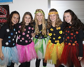 Neighbors | Abby Slanker.A group of Canfield Village Middle School seventh-grade students dressed as Mother Nature and the four seasons during the school’s annual Halloween dress up day on Oct. 31.