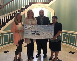 Home Savings Charitable Foundation recently donated $2,500 to Project 180 for renovations to the Esther Home for Women, part of Project 180’s Women’s Residence Project. The Esther Home is an alternative path to rehabilitation where women are able to live, receive counseling and build a spiritual relationship with God. For more information regarding Project 180, call 330-599-8236 or visit weareproject180.org. From left are Sara Johnson, Project 180; April Mack, executive director, Project 180; Andrew Nemergut, area manager, Home Savings Eastwood Branch; and Nancy Tabor, area manager, Home Savings Liberty Branch.

