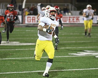   ROBERT K YOSAY  | THE VINDICATOR..CM #2 Chris Gruber rumbles  80 Yard for a TD .Cardinal Mooney vs Steubenville Big Red at Salem Stadium...-30-